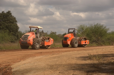 tractors working on road